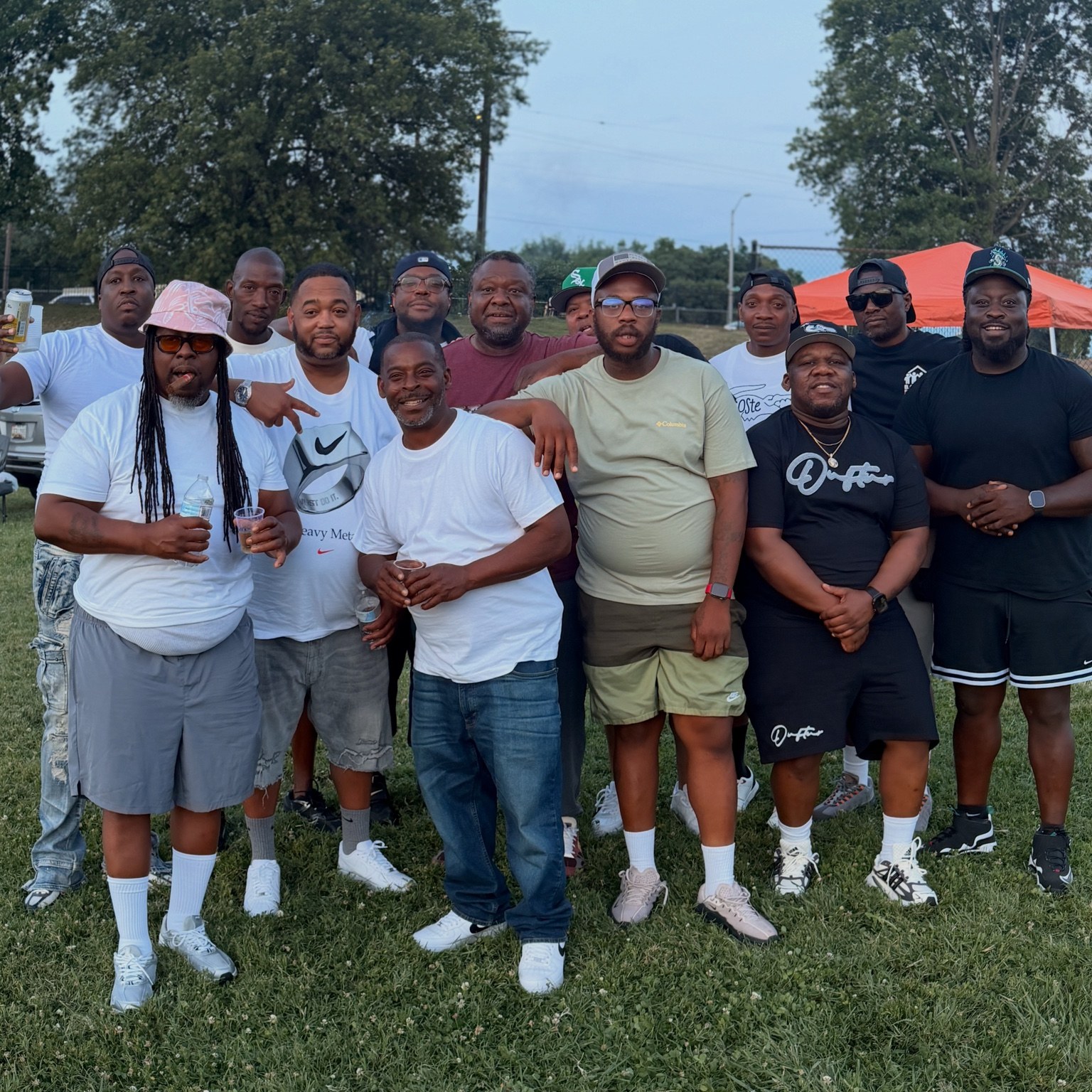 Group photo from a B.O.C.E.K Foundation Father’s Day Cookout